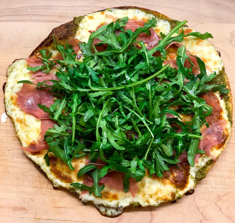 Cauliflower Pizza with Pesto, Mozzarella, Prosciutto + Arugula Recipe