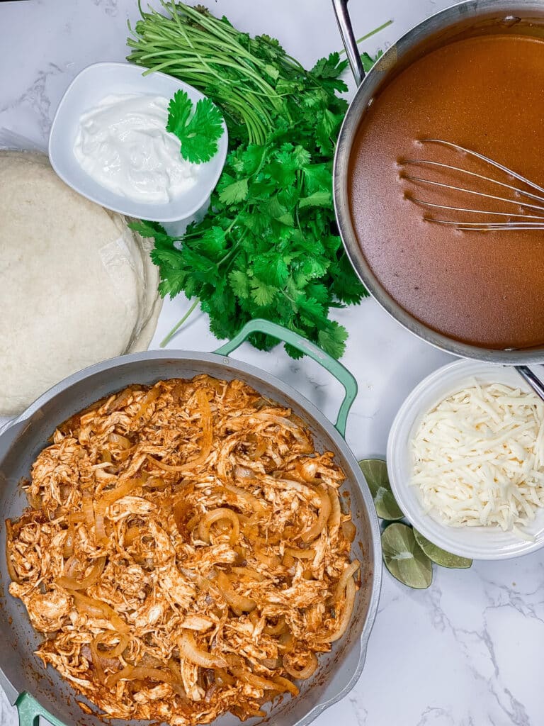 https://thesavvyspoon.com/wp-content/uploads/2021/10/Lazy-Girl-Pumpkin-Spice-Chicken-Enchiladas-by-The-Savvy-Spoon-1-768x1024.jpg